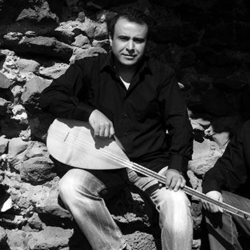 Tüm vücudum parça parça bölünse - Söz:Muhlis Akarsu Müzik:Murat Aldemir