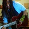 Strummingthepainaway