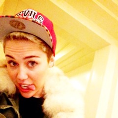 Miley Cyrus          v