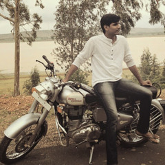 Kartik M