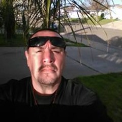 Mark F Dennison