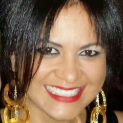 Commissioner Luz Weinberg