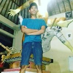 I Wiastika Komang
