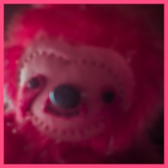 Charlie, on the moon, standing by an old tire