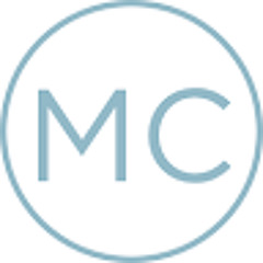 M C