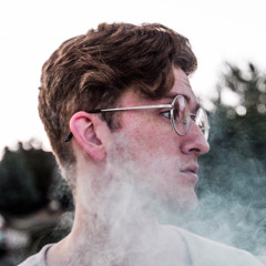 The Boy with Round Glasses