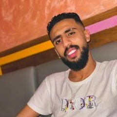 AĥḿẽD T. NaSsr
