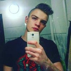 Олег Кошарний