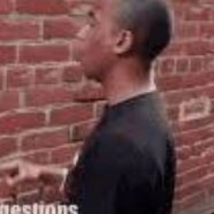 black dude staring at wall