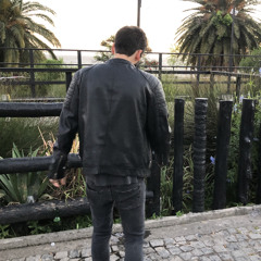 J.