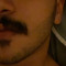 M.