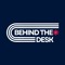 BEHIND THE DESK*