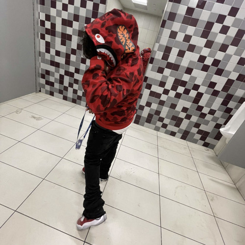 red bape hoodie on person