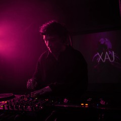 XAj