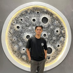 REZA MUNIZAR