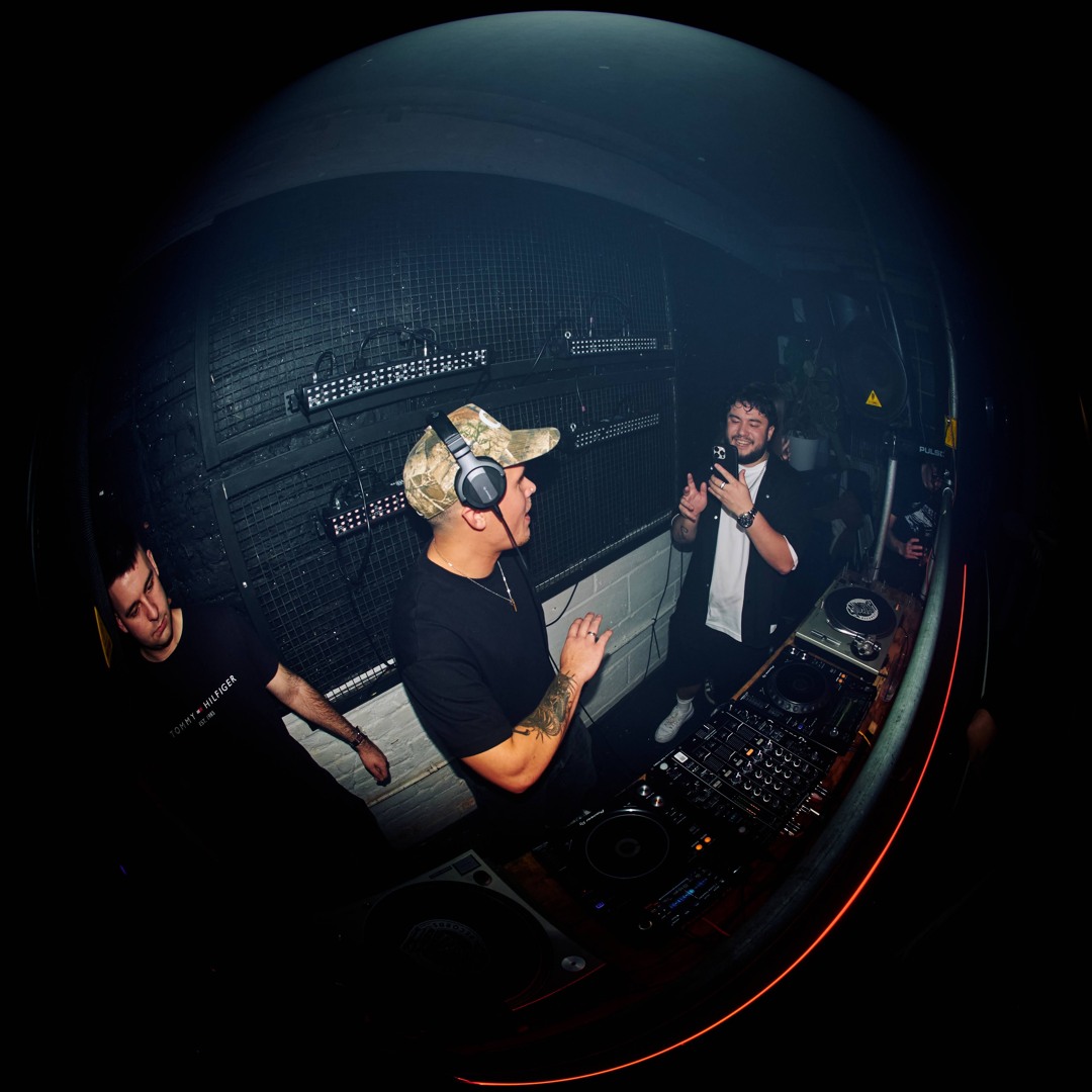 Ryan Witt playing a club booth